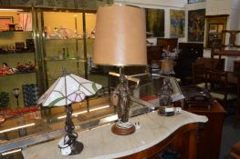 Three decorative table lamps.