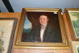 A bust length portrait of a young gentleman wearing a dark blue coat, oil on board.