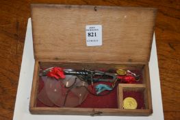 A boxed set of sovereign scales.