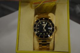 An Invicta gentlemen's gilt metal wristwatch.