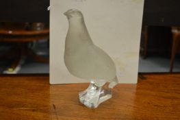 A Lalique frosted glass model of a partridge.