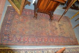 An old Persian carpet (some wear).