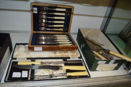 A cased set of fish knives and forks, a carving set and various flatware.