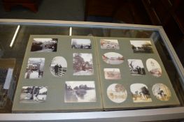 An early photograph album containing numerous black and white photos of seaside trips etc.