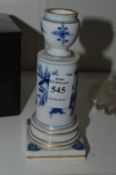 A Meissen blue and white candlestick.