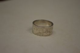 An unusual ring made from a 1954 shilling, size L1/2 (made made Mick Griffiths).