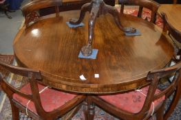 A good Regency rosewood circular tilt top breakfast table on turned column support with four
