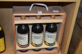 A cased set of three French wines.