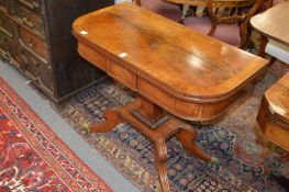 A 19th century mahogany D-shaped foldover card table on a square column support platform base with