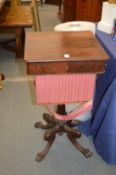 A 19th century mahogany sewing table, possibly Isle of Man, with unusual carved base.