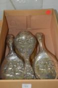Three silver backed dressing table brushes.