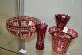 A good cut glass and ruby tinted bowl and three similar items.