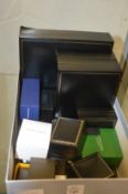 A quantity of empty jewellery boxes.