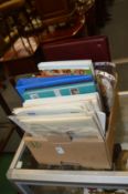 A box containing numerous albums and loose leaves of World stamps etc.