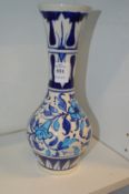 An Iznik style pottery vase.