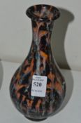 A Chinese bottle vase with mottled glazed decoration.