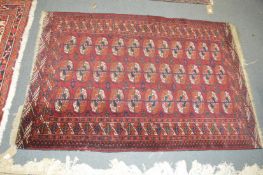 A Persian Tekke Bokhara rug.
