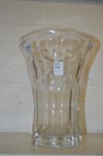 A large cut glass vase.