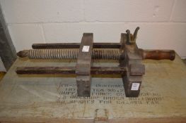 Two large old wooden carpenter's vices.