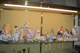 A quantity of decorative ornaments to include Staffordshire figures.