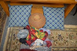 Ladies' head scarves, a pair of cushions and a sewing basket.