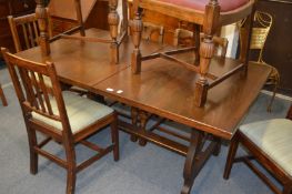 An oak refectory style extending dining table.