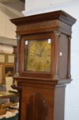 A 19th century mahogany cased thirty hour long case clock, the engraved brass dial signed Thomas