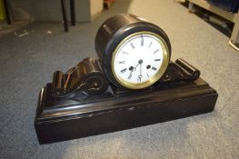 A Victorian slate mantle clock.