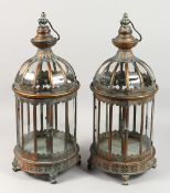 A PAIR OF METAL CIRCULAR HANGING LAMPS. 24ins.