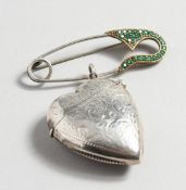 A SILVER HEART SHAPED VESTA AND PIN.