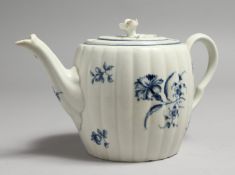 AN 18TH CENTURY WORCESTER TEAPOT AND COVER painted with the Gilliflower pattern.