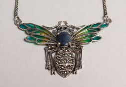 A SILVER SAPPHIRE SET BEE PENDANT on chain.