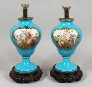 A VERY GOOD PAIR OF 19TH CENTURY SEVRES PORCELAIN LAMPS, painted with reverse panels of figures