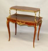 A GOOD LOUIS XVI STYLE TWO-TIER TABLE, with chequered inlay and ormolu mounts, carrying handles to