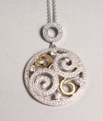 AN 18CT WHITE AND YELLOW GOLD DIAMOND SET PENDANT AND CHAIN.