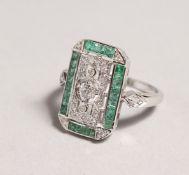 A 9CT GOLD, EMERALD, AND DIAMOND DECO STYLE RING.