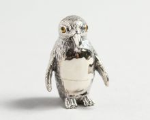 A CAST SILVER PENGUIN.