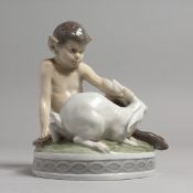 A COPENHAGEN PORCELAIN GROUP, Pan with a rabbit on a circular base, No. 439. 5ins high.