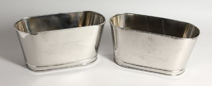 A SMALL PAIR OF BOLLINGER COOLERS.