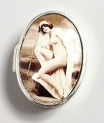 A SILVER EROTIC PILL BOX.