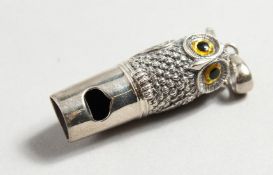 A NOVELTY SILVER OWL WHISTLE.