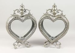 A PAIR OF METAL HEART SHAPED HANGING LAMPS. 22ins.