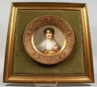 A GOOD VIENNA PORTRAIT PLATE, head and shoulders of a young boy. Signed.