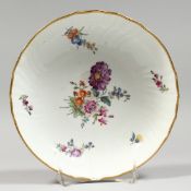 A COPENHAGEN CIRCULAR DISH painted with flowers 7.75ins diameter.