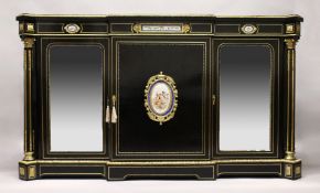 A VERY GOOD 19TH CENTURY FRENCH EBONY BREAK FRONT CREDENZA, with ornate mounts inset with Sevres