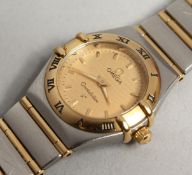 A GOOD OMEGA CONSTELLATION CHAMPAGNE FACE WRISTWATCH, BOXED.