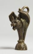 A BRASS SEAL, cat with bat’s wings.