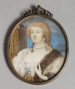 17TH CENTURY ENGLISH SCHOOL EARLY PORTRAIT MINIATURE OF A LADY in a silver frame. 3.25ins x 2.
