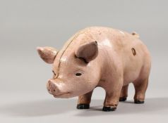 A CAST IRON PIG MONEY BOX. 7ins long.