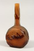 A SMALL AMBER GLASS BOTTLE, etched with a locust and flowers, signed Galle. 5ins high.